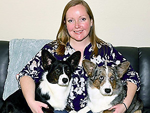 Veterinarian Samantha Nye with her Corgi dogs