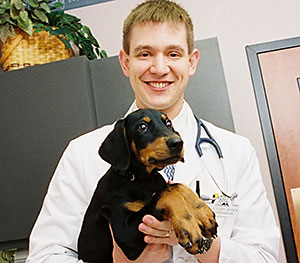 Dr Ryder with a puppy